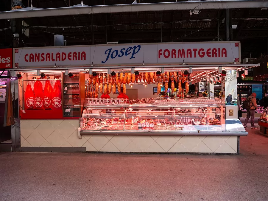 Charcuterie stall at La Boqueria market in Barcelona